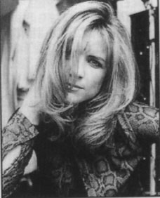 Courtney Thorne-Smith (Georgia Thomas)