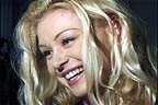 Portia de Rossi (Nell Porter)