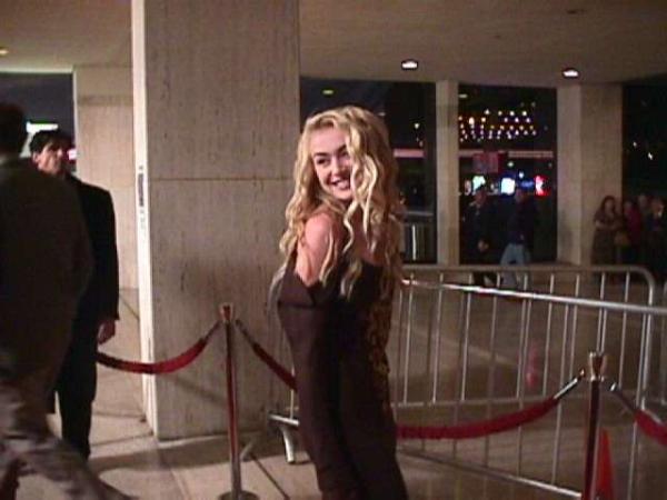 Portia de Rossi (Nell Porter)