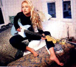 Portia de Rossi (Nell Porter)