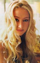 Portia de Rossi (Nell Porter)