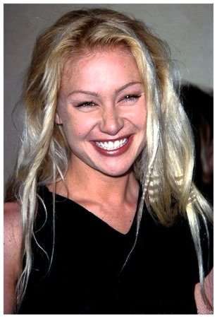 Portia de Rossi (Nell Porter)