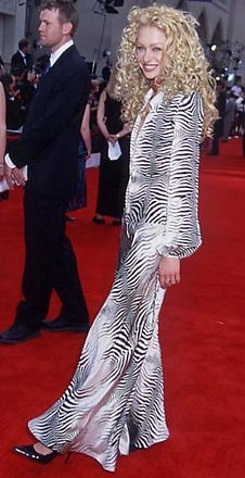 Portia de Rossi (Nell Porter)