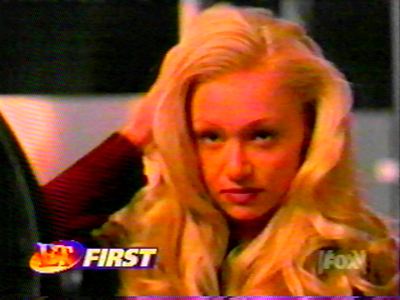 Portia de Rossi (Nell Porter)