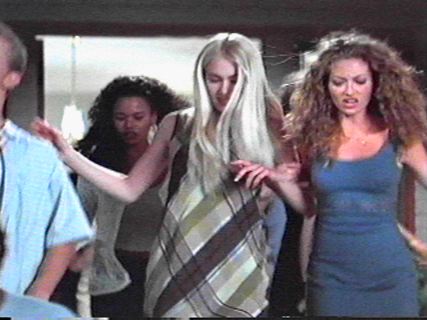 Portia de Rossi (Nell Porter)