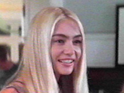 Portia de Rossi (Nell Porter)