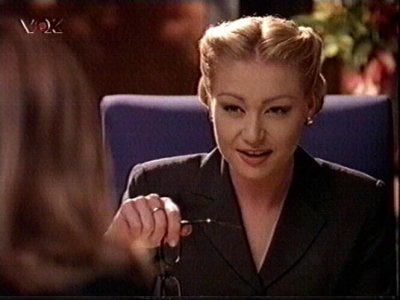 Portia de Rossi (Nell Porter)